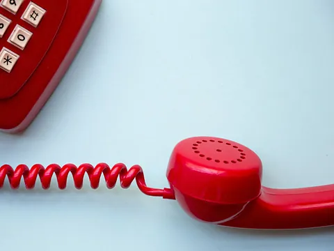 Traditionelles Telefon für kirchliche Anfragen und Hilfe.